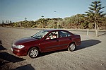 South Australia    -    Torsdag d. 15 februar\n\nVi sidder i bilen ved kysten og skriver dagbog og venter p at solen skal g ned.